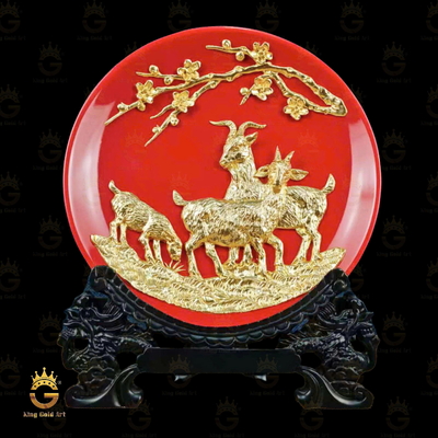 Tranh Đĩa Gốm Men Đỏ Đàn Dê Dưới Cành Mai Dát Vàng